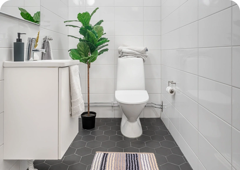 Small bathroom featuring hexagonal floor tiles